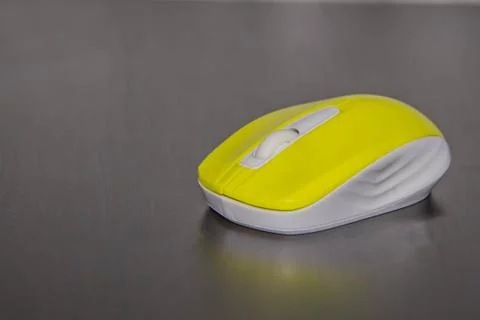 Computer mouse yellow Stock Photos