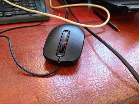 Computer mouse's photo on the table Stock Photos