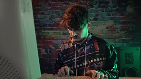 Computer Nerd From 1990's Working on Desktop Computer, Having Problem With Stock Footage 303009247