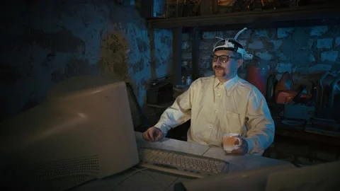 Computer nerd with a mustache and wacky glasses. Home Office. Stock-Footage 154093721