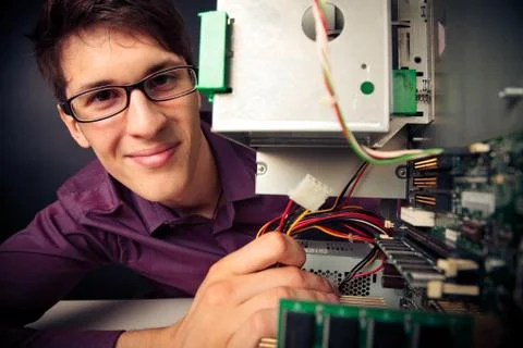 Computer Nerd Upgrading His PC Stock Photos