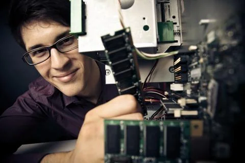 Computer Nerd Upgrading His PC Stock Photos