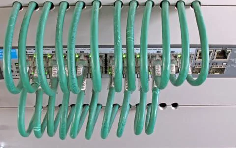 Computer network cable in a rack of data processing center Stock Photos