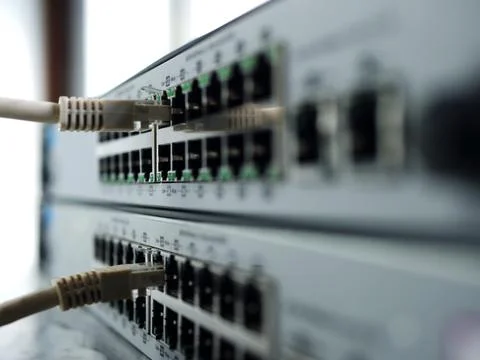 Computer network Ethernet switch ports with cables Stock Photos
