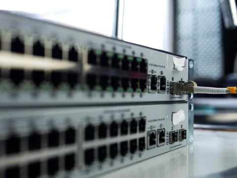 Computer network Ethernet switch ports with cables Stock Photos