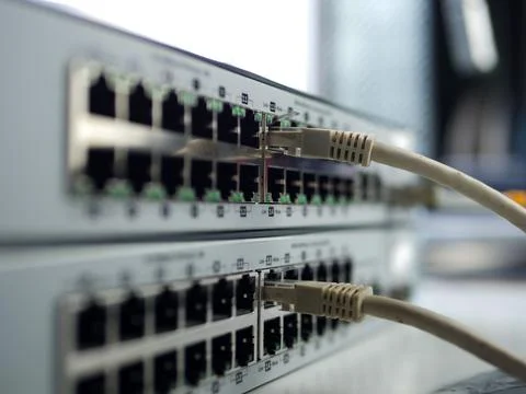 Computer network Ethernet switch ports with cables Stock Photos