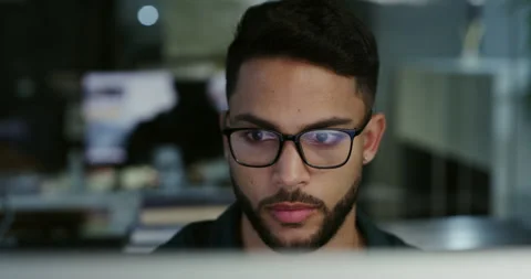 Computer, night and male developer working in the office developing an online Video stock 242036845