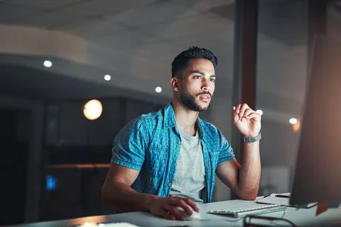 Computer, night and programming with man in office for software development.. Stock Photos