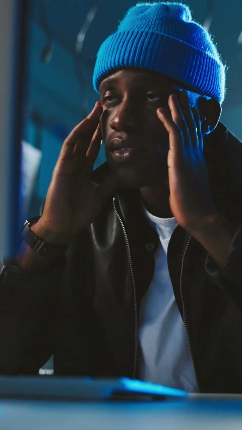 Computer, night and stress with black man hacker in server room for cybercrime Stock Footage 333673029