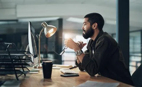 Computer, night and web design with man in office for online coding or Stock Photos