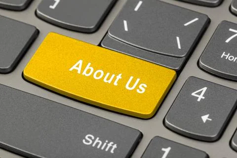 Computer notebook keyboard with About Us key Stock Photos