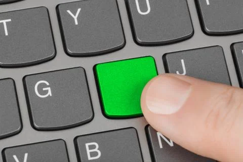 Computer notebook keyboard with blank green key Foto stock