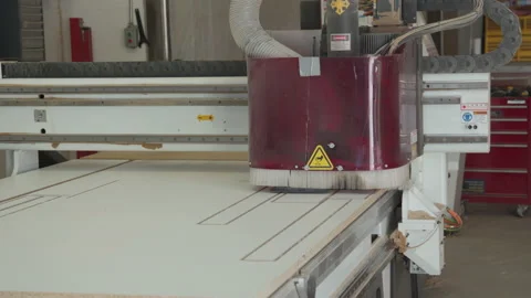A computer numerical control, CNC, router is a computer controlled cutting Stock Footage 130976105