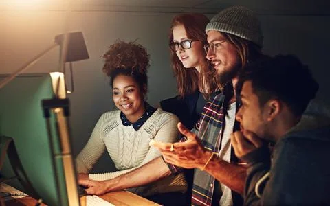 Computer, office collaboration or night team programming ERP software Stock Photos