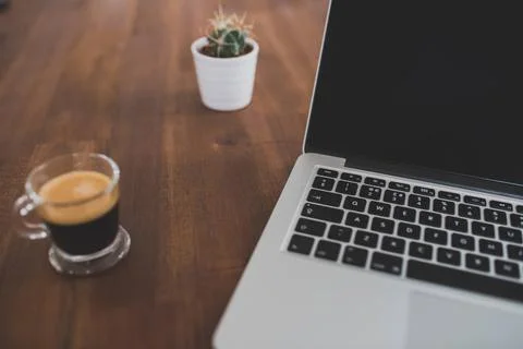 Computer on Office Desk with Coffee Stock Photos