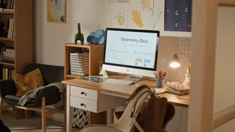Computer with Online Geometry Quiz on Desk in Boys Bedroom Stock Footage 334960049