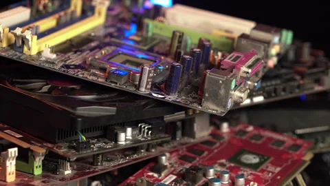 Computer Parts as Electronic Waste, Heap of Motherboards and Graphic Cards Stockbeeldmateriaal 331330938