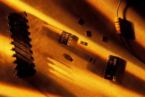 Computer Parts In Sand Stock Photos