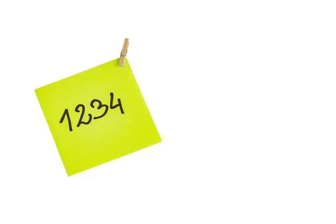 Computer password written on a yellow memo-stick computer passwords Stock Photos