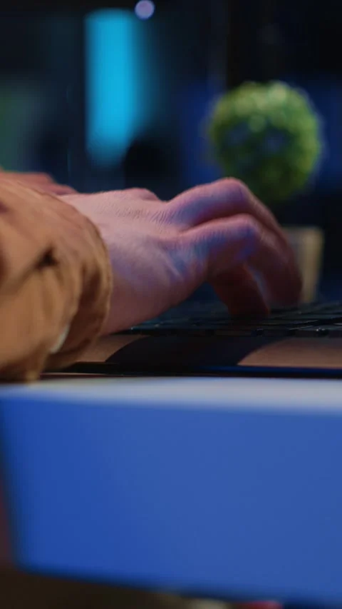 Computer peripherals used by programmer to write lines of code on computer Stock Footage 264512974