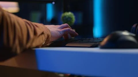 Computer peripherals used by programmer to write lines of code on computer Stock Photos