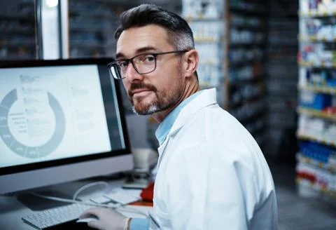 Computer, pharmacy and portrait of man in store for drug development, healt.. Stock Photos