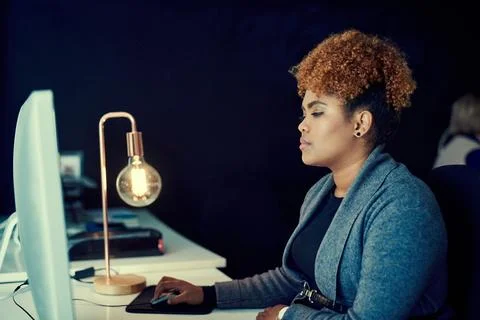 Computer, planning and reading with business woman in office for night, rep.. Stock Photos
