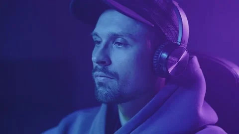 Computer player with headphones, hand gesture no Stock Footage 209990926