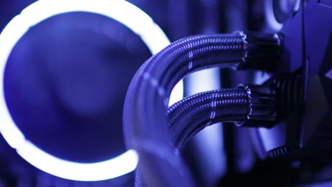 Computer power cables inside PC with flashing blue and white illumination Stock Footage 218383663