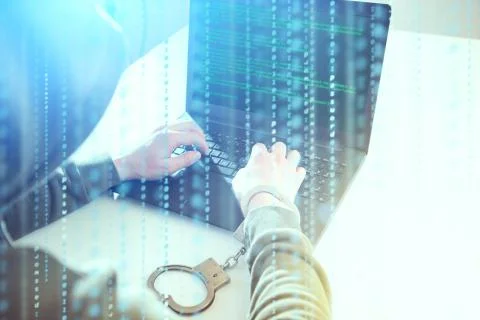 Computer privacy attack. Hackers programmer look on screen and forcibly writes Foto stock