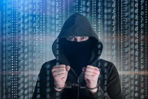Computer privacy attack. Hackers programmer look on screen and forcibly writes Stock Photos