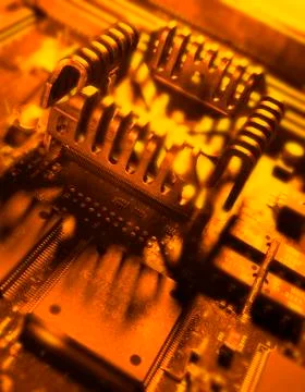COMPUTER PROCESSOR CHIP ON MOTHERBOARD IN CLOSE UP 写真素材
