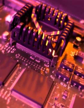 COMPUTER PROCESSOR CHIP ON MOTHERBOARD IN CLOSE UP 写真素材