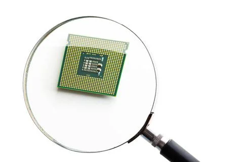 Computer processor. Computer processor. Look through a magnifying glass. C... Stock Photos