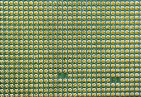 Computer processor, contact feet. Electronic board with electrical components 写真素材