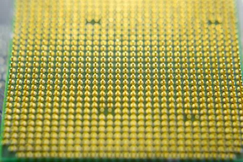 Computer processor, contact feet. Electronic board with electrical components 스톡 사진