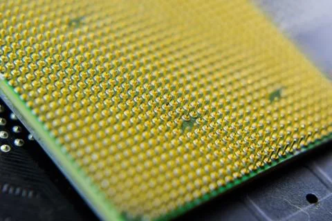 Computer processor, contact feet. Electronic board with electrical components 스톡 사진