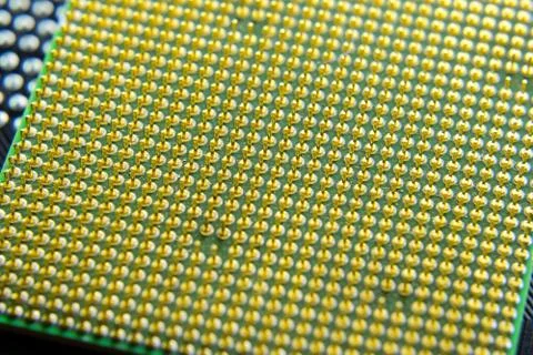 Computer processor, contact feet. Electronic board with electrical components 写真素材