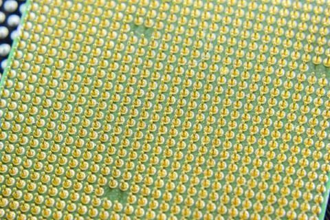 Computer processor, contact feet. Electronic board with electrical components 写真素材