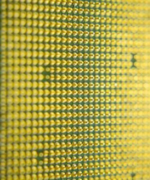 Computer processor, contact feet. Electronic board with electrical components 写真素材