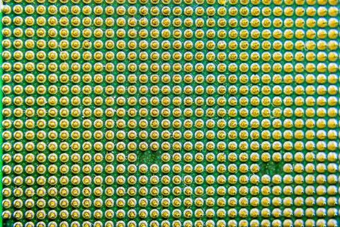 Computer processor, contact feet. Electronic board with electrical compone... Foto stock