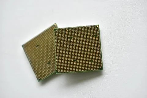 Computer processor with contact legs on a white background 写真素材