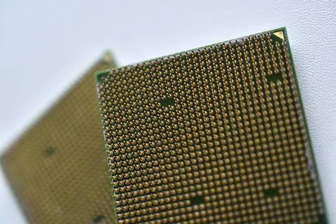 Computer processor with contact legs on a white background Stock Photos