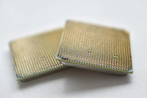 Computer processor with contact legs on a white background 写真素材