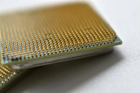 Computer processor with contact legs on a white background 写真素材