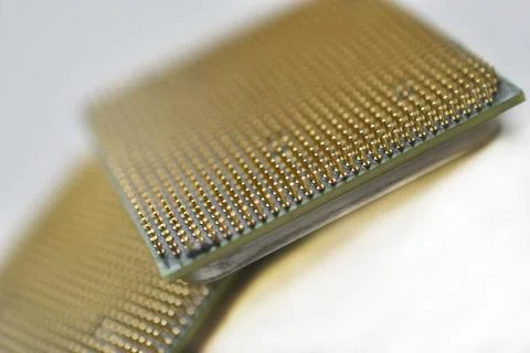 Computer processor with contact legs on a white background 写真素材