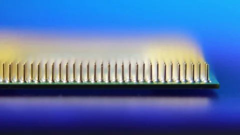 Computer Processor CPU On Blue Background. Macro Close-Up Shot. Stock Footage 98997929