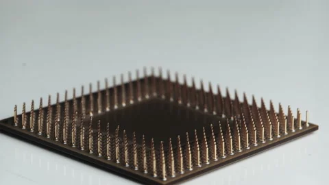 The Computer Processor CPU with Gold Plated Contacts Spins on White Background 库存影片 145917390