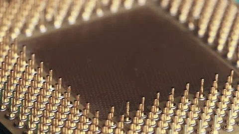 The Computer Processor CPU with Gold Plated Contacts Spins on Green Background 库存影片 145917537