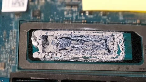 Computer Processor with Dried Thermal Compound Macro Shot Vídeo Stock 314013286